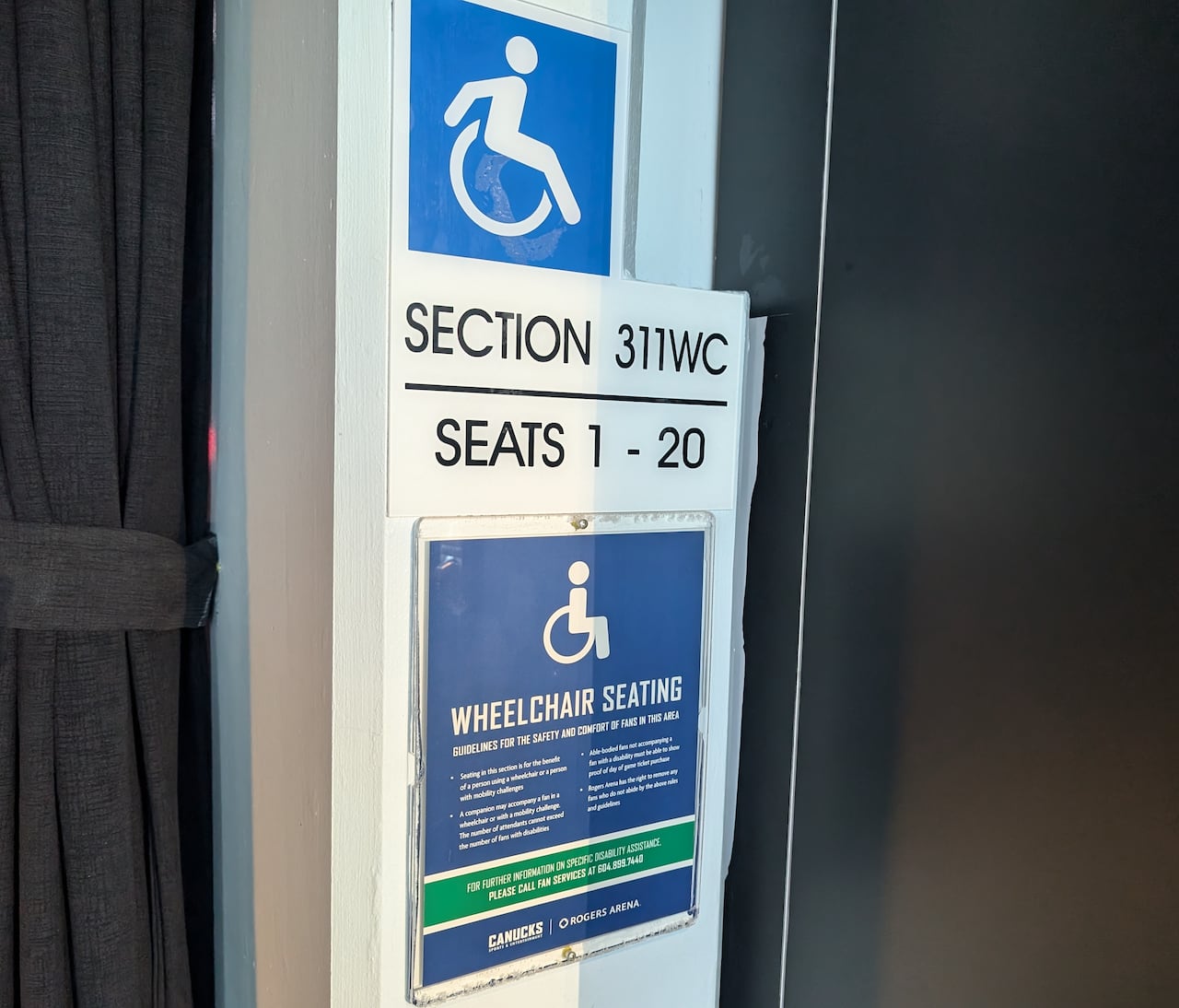 Sign showing a wheelchair with the words 'Wheelchair seating'