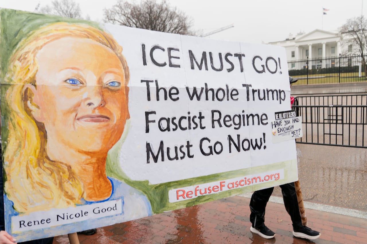 Demonstrators protest outside the White House in Washington, Saturday, Jan. 10, 2026, against the Immigration and Customs Enforcement agent who fatally shot Renee Good in Minneapolis. (AP Photo/Jose Luis Magana)