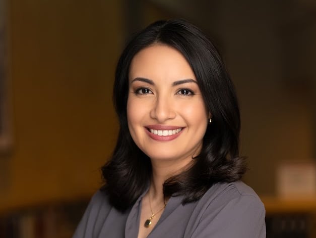 A person poses for a photo.