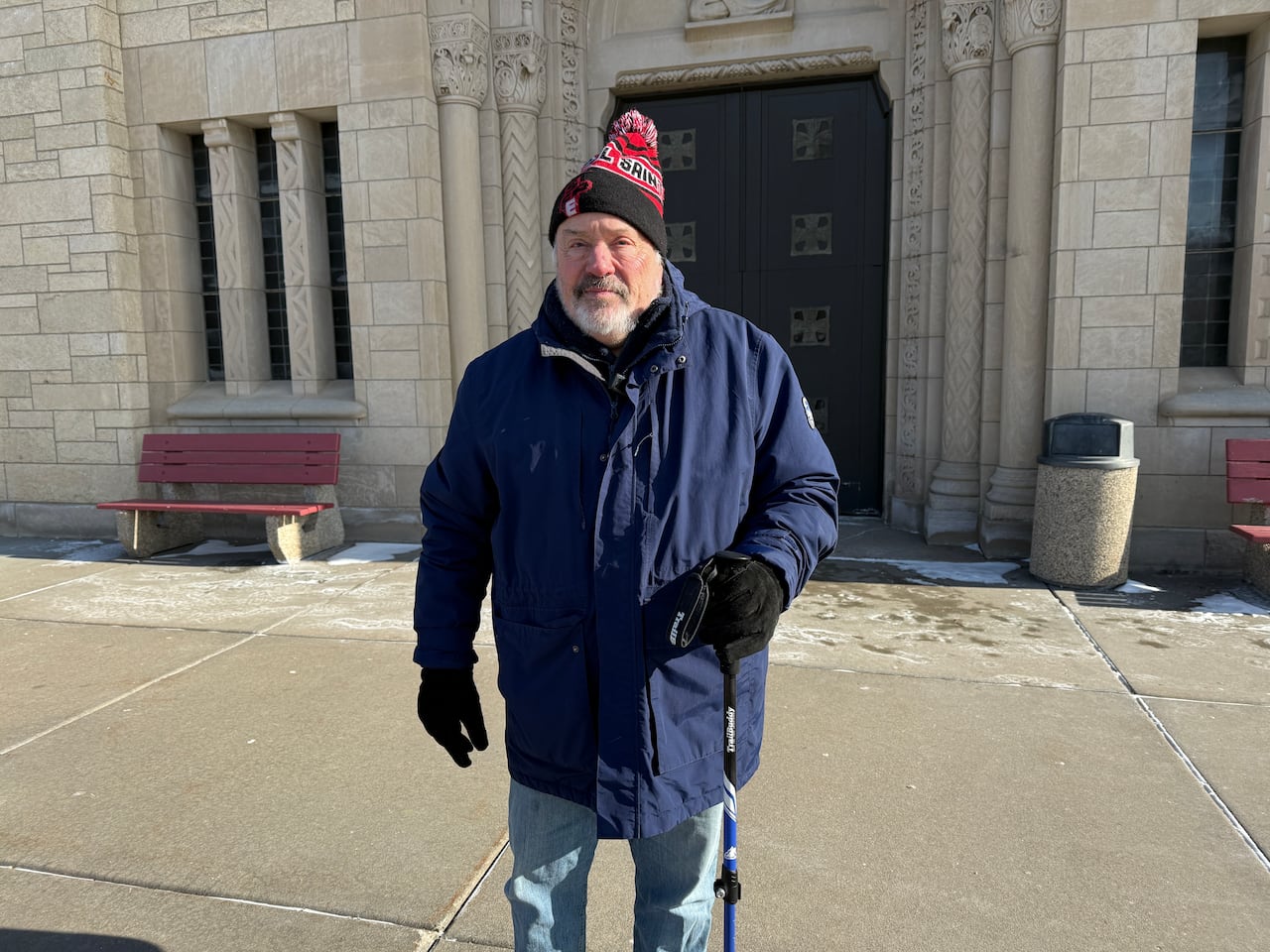 A person poses for a photograph.